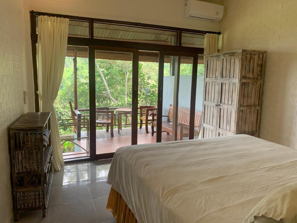 D'Tepi Ubud House Extérieur photo