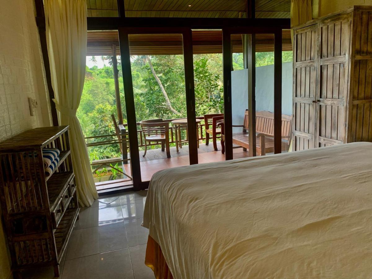 D'Tepi Ubud House Extérieur photo