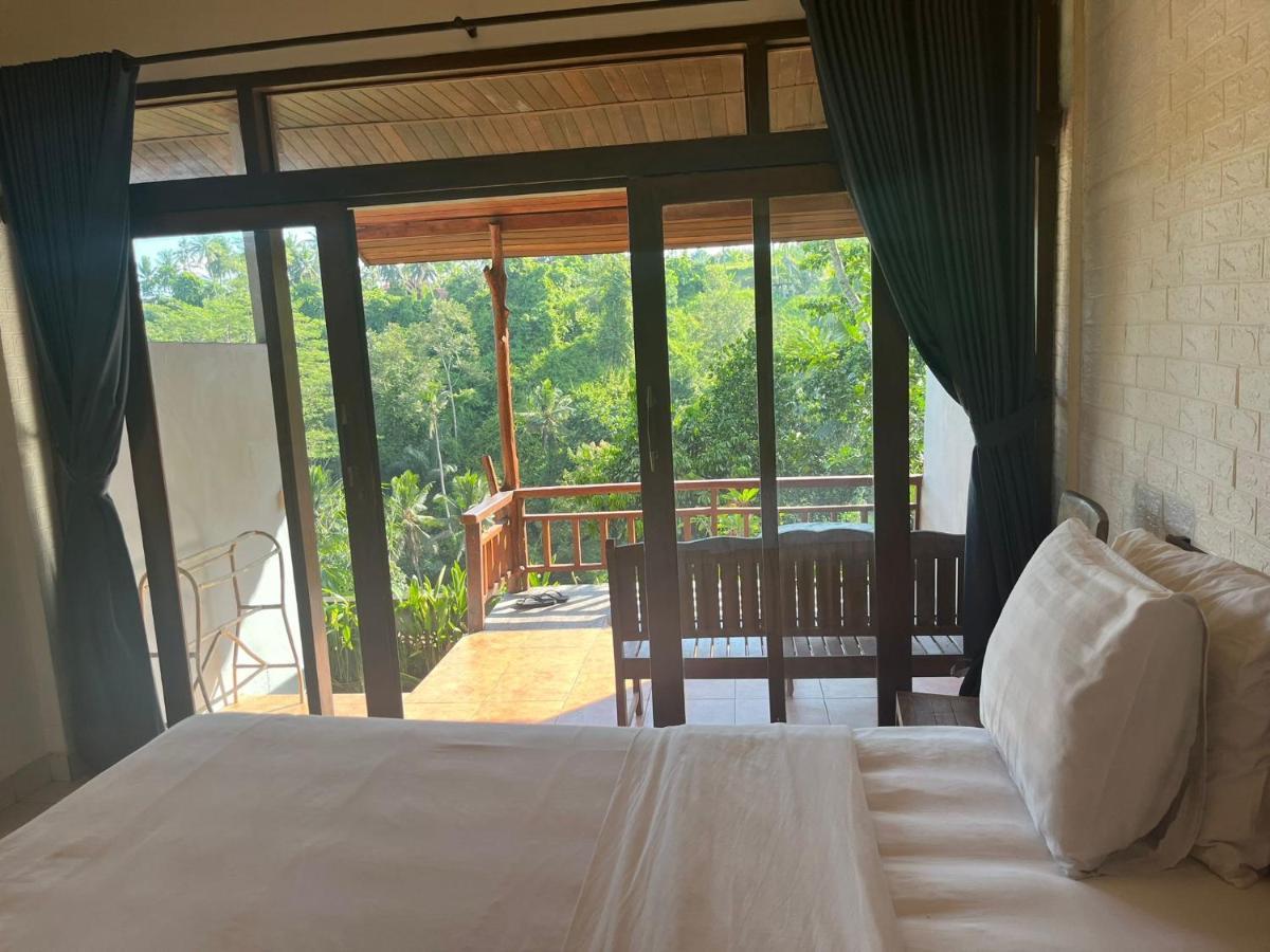 D'Tepi Ubud House Extérieur photo